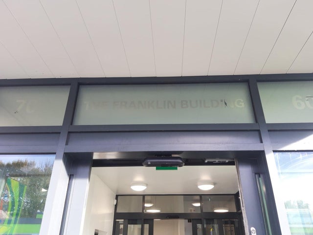 The Franklin Building includes Alex's collar number, 7060.